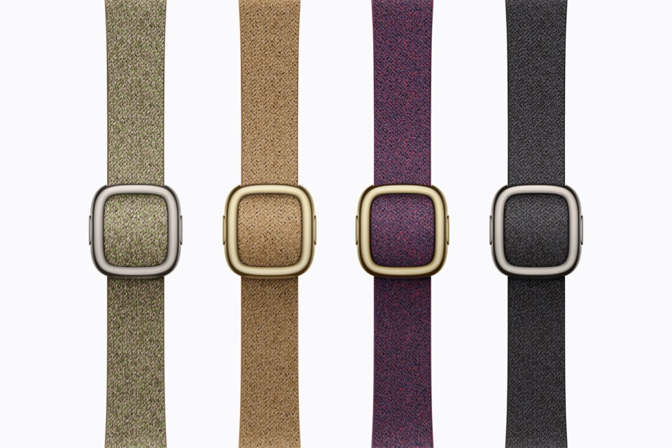 Baksiden av fire Apple Watch Series 12 med Moderne spenne-remmer i ulike farger