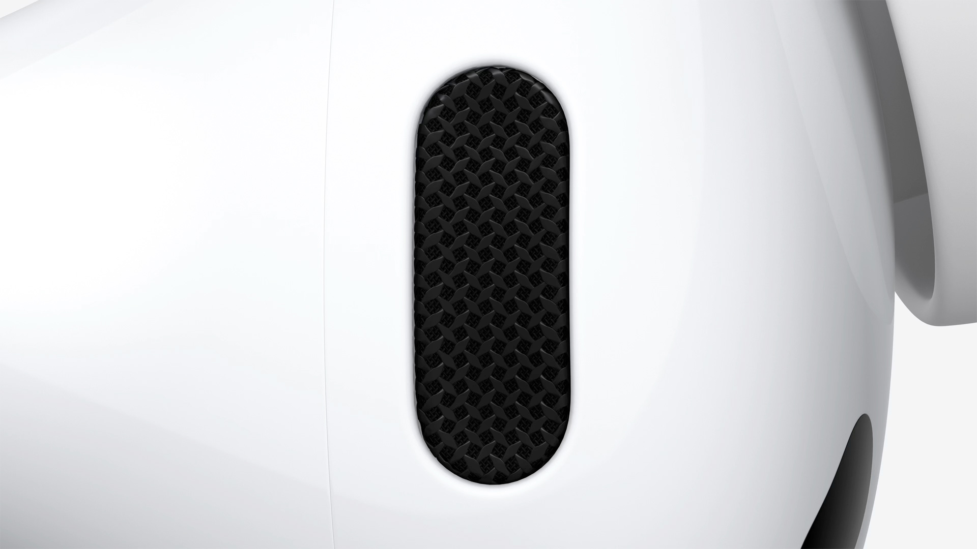 Nærbilde av mikrofonnettingen på AirPods Pro 3